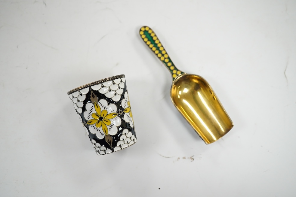 A Soviet Union 916 gilt white metal and enamel caddy spoon, 91mm and vodka tot, 44mm. Condition - good